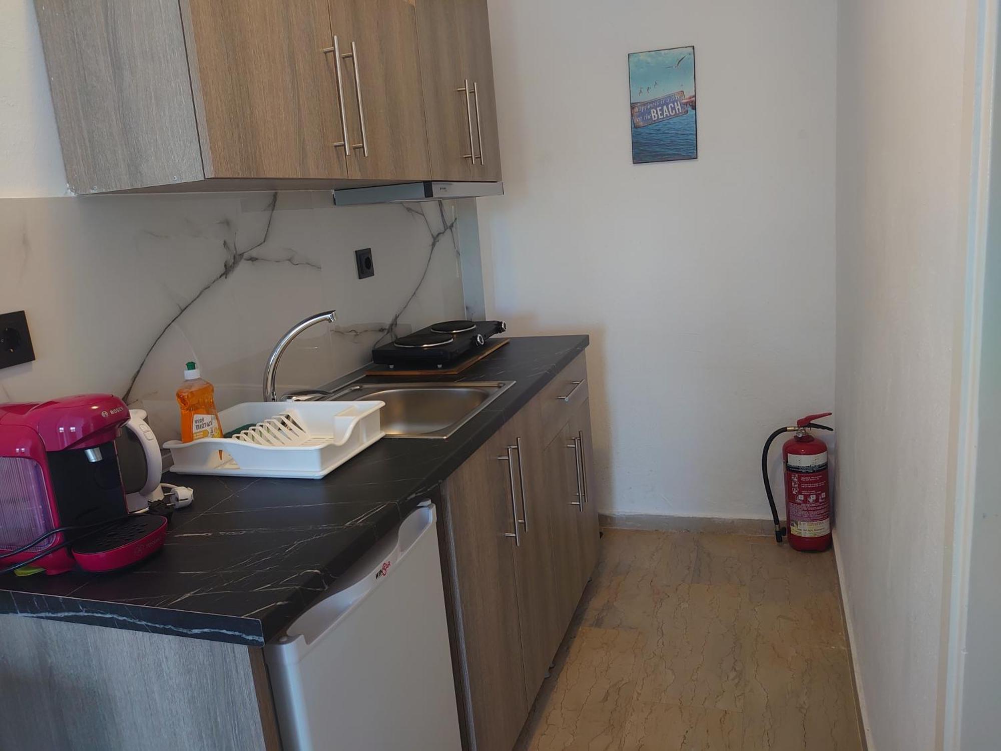 Merida Apartments Mola Kalyva Bagian luar foto