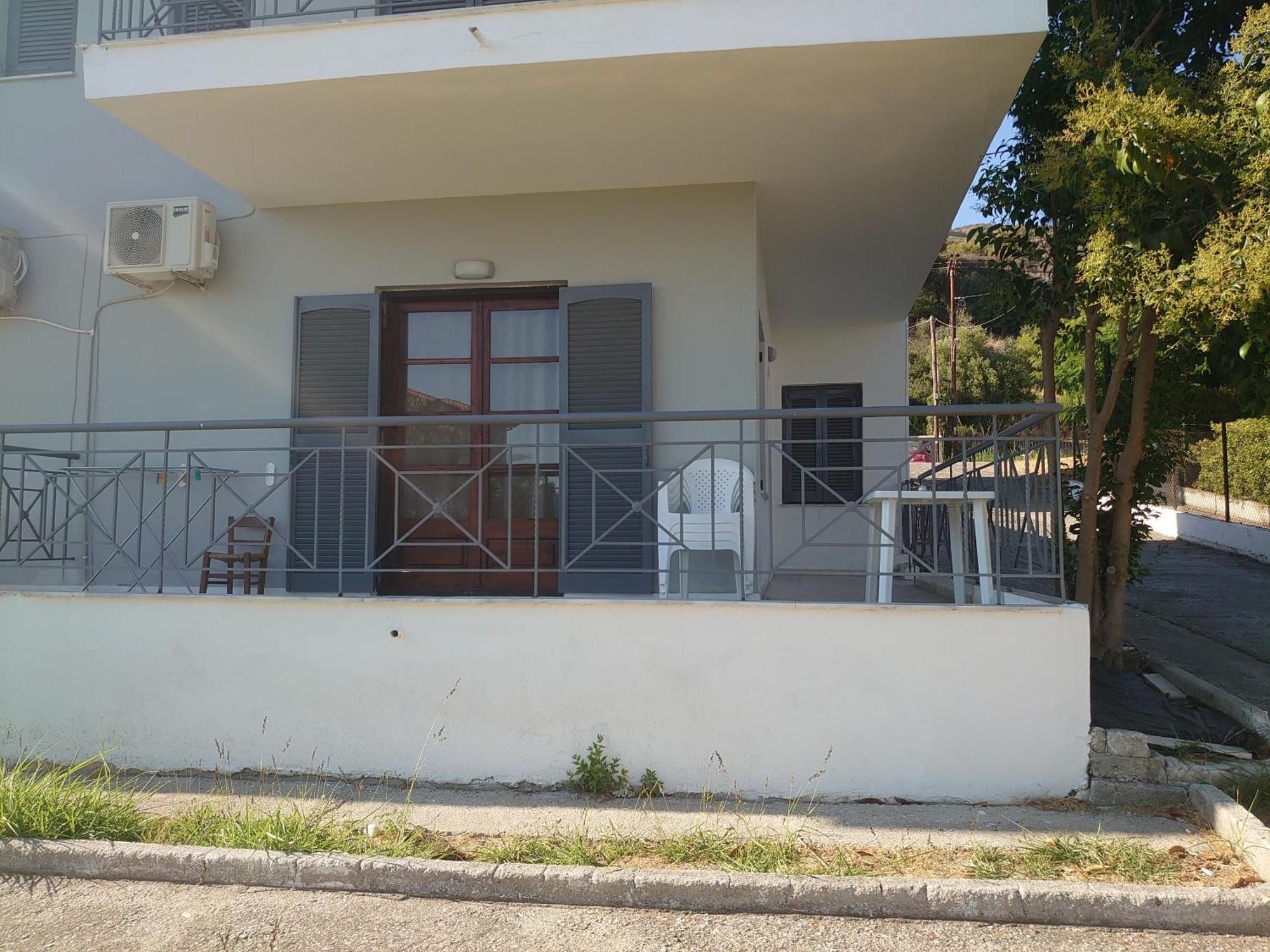 Merida Apartments Mola Kalyva Bagian luar foto